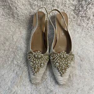 Whittall Shon fabric off white satin scrunch 
White Pearl Embellished Shoes SZ12